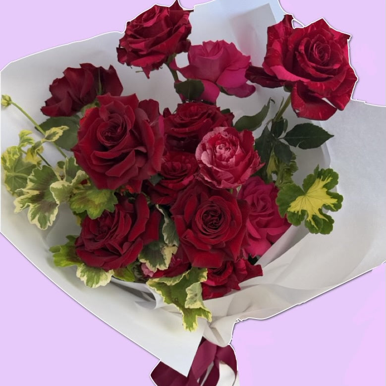 The Headliner | One Dozen Roses