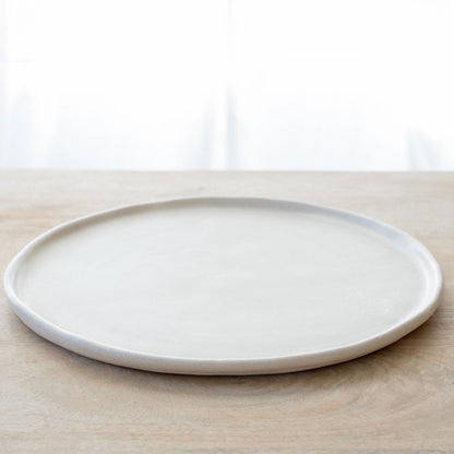 High rim vanilla cream dinner plate