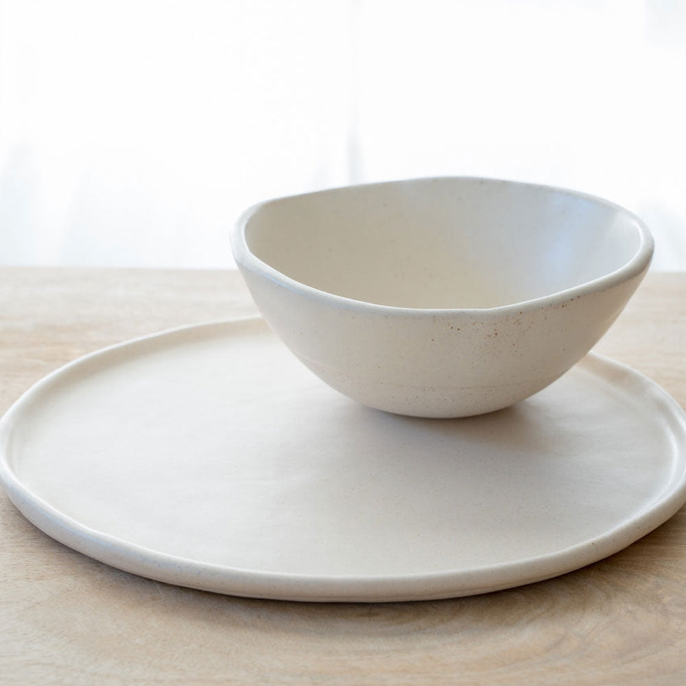 High rim vanilla cream dinner plate